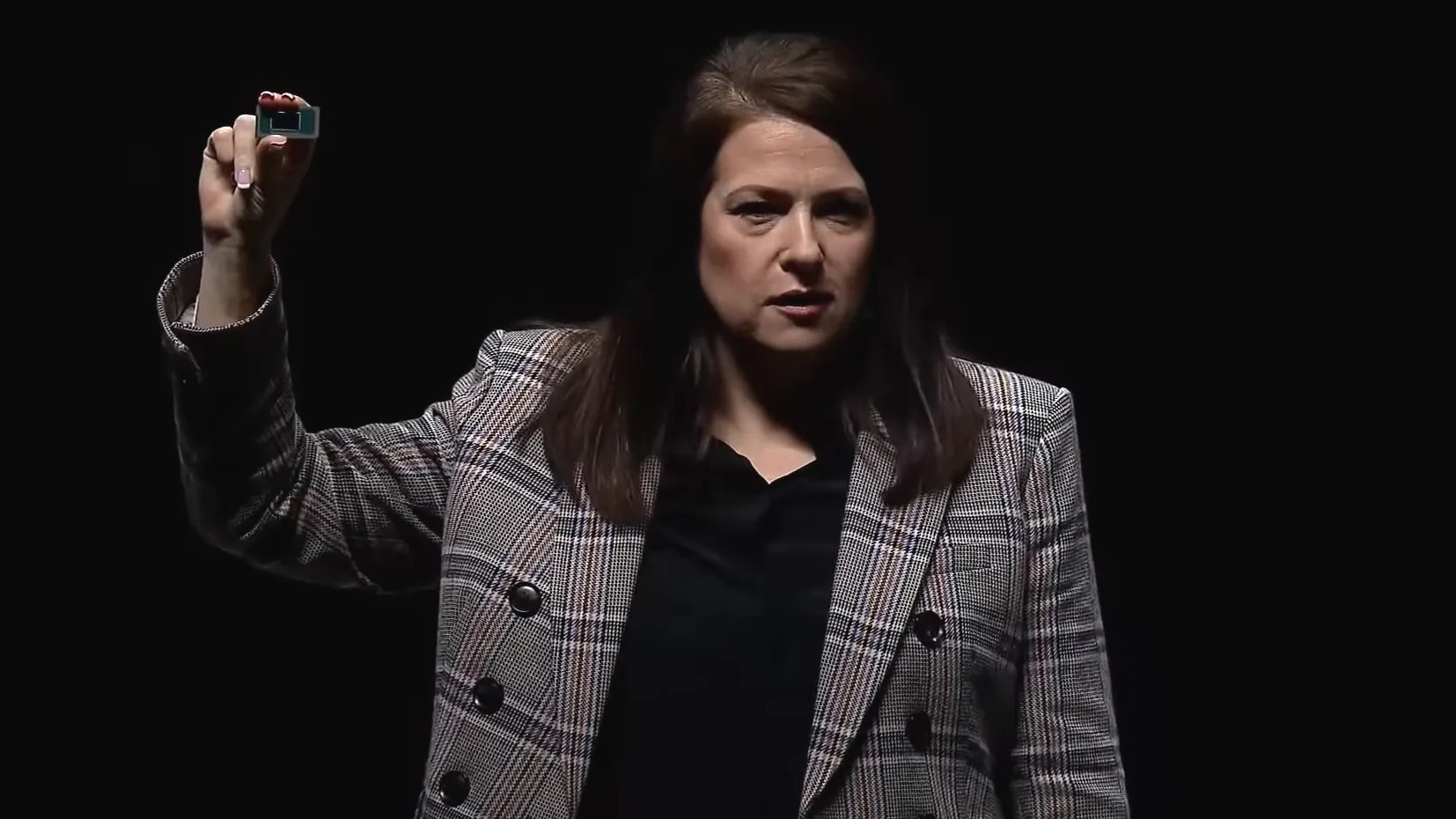 Intel's Interim Co-CEO Michelle Johnston Holthaus holding a Panther Lake processor sample at its CES 2025 keynote