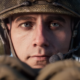 A soldier looks out over the Verdansk map, as a single tear rolls down his cheek.