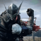 An Elden Ring Nightreign character clad in full armor, rearing back what looks to be a small crossbow before firing.