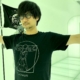 Hideo Kojima wearing a Policenauts t-shirt.