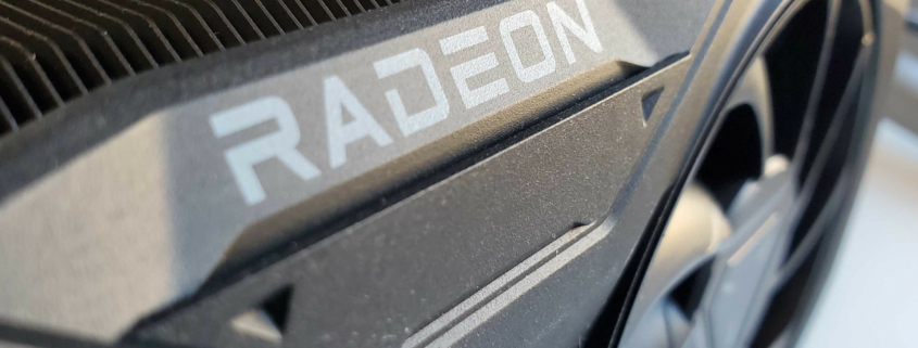 A photo of the AMD Radeon logo on a graphics card