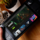 Valve Steam Deck with GeForce Now app overlaid on screen.