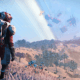 An image of an explorer from Hello Games' No Man's Sky, standing over a vast and verdant planet.