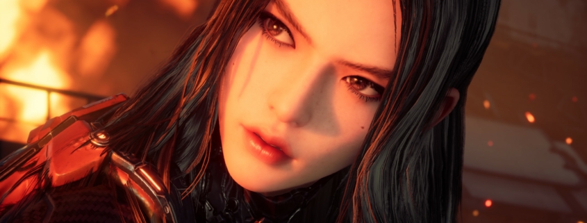 Tachy, with her face lit by fire in the background